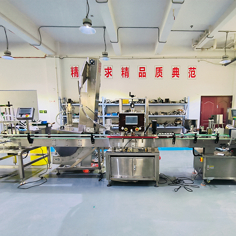 西安直線式夾蓋機(jī)-整套灌裝旋蓋機(jī)械
